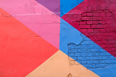 Colorful (purple, blue pink and beige) brick wall as background, textureの写真素材
