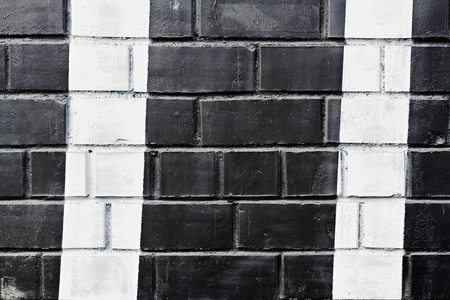 Black and white painted brick wall as background, textureの写真素材