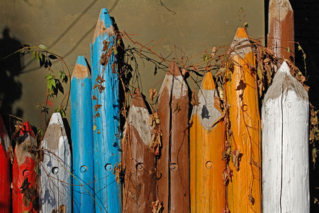 Large wooden colored pencils embroidered with decorative grapes outdoorsの写真素材