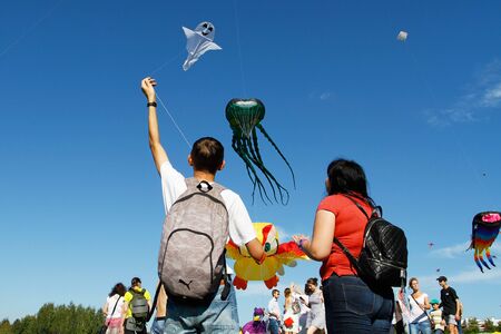 Moscow, Russia - August 27, 2016: People launche a kite into the sky at the kite festival in the Park Tsaritsyno in Moscowのeditorial素材