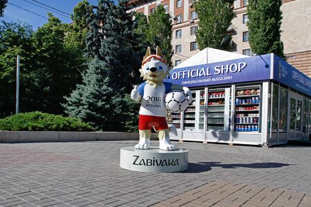 Volgograd, Russia- June 14, 2018: Official mascot of the 2018 FIFA World Cup wolf Zabivaka standing near official souvenir shop in Volgogradのeditorial素材