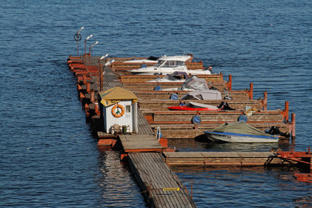 Volgograd, Russia - June 13, 2015: Motorboats on yacht parking on the river Volga in Volgograd