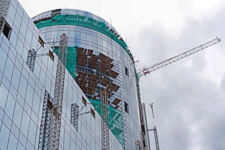 Krasnogorsk, Moscow region, Russia - July 28, 2019: New office or residential building under construction in Krasnogorskのeditorial素材