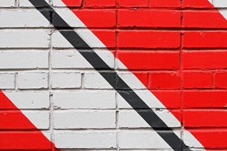 Colorful (red, white and black) painted brick wall as background, textureの写真素材
