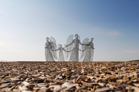 Kamenka, Lipetsk oblast, Russia - August 07, 2020: Metal sculpture of angels holding hands as art object on "Kudykina mountain" in Lipetsk oblastのeditorial素材