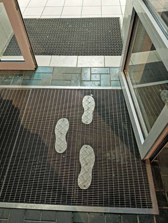 Metal dirt-proof grille with protective plates for heelsの写真素材