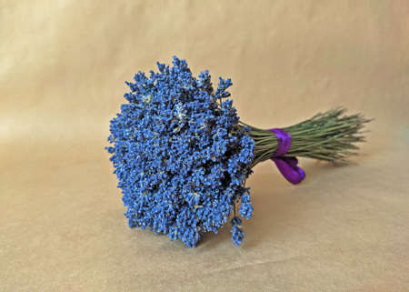 Bouquet of lavender on the background of craft paperの写真素材