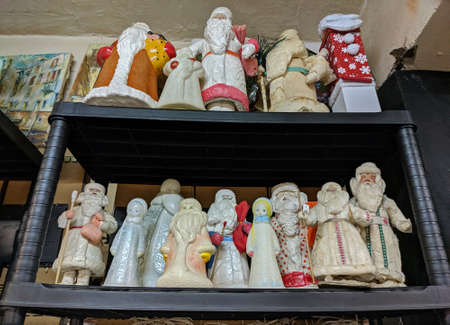 Moscow, Russia - January 10, 2020: Plastic and cotton figurines of Father Frost and Snegurochka (Snow Maiden) at a flea market of the Kristall plant in Moscowのeditorial素材