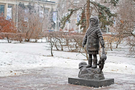 Volgograd, Russia - December 29, 2020: Monument to a girl with a teddy bear called "Children of military Stalingrad" (sculptor Sergey Shcherbakov) standing on Lenin Square in Volgogradのeditorial素材
