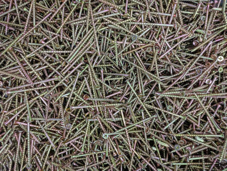 Background or texture of galvanized and reinforced wood screwsの写真素材