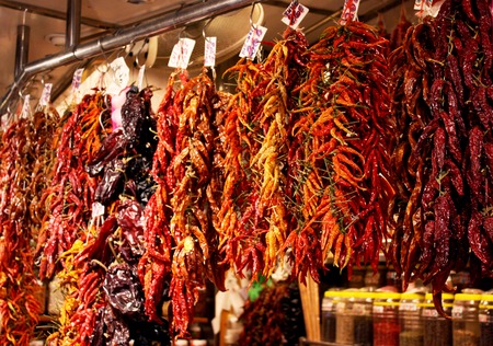 Bunch of red peppers at La Boqueria market in Barcelona, Spain.の写真素材
