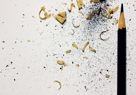 Blue pencil and crayon shavings with place for your text or other design elements.の写真素材