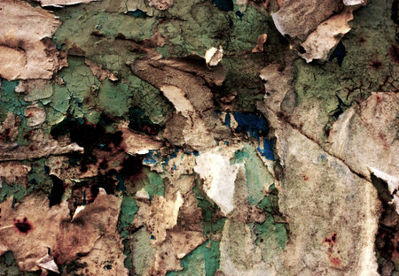 Old, torn bulletin board. Street empty public billboard, dirty wall with rust. Bright colorful...