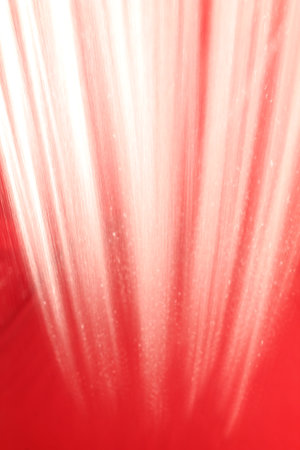 abstract red background texture with some smooth lines in it and some spots on itの写真素材