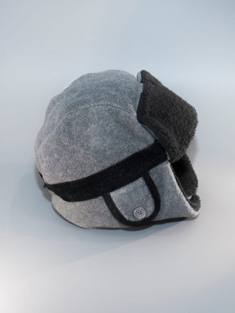 Men's gray cap with a hood on a white background, isolate