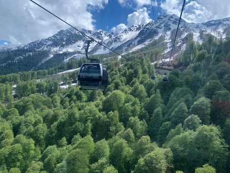 Cable car in the mountains of the Caucasus on a sunny day
