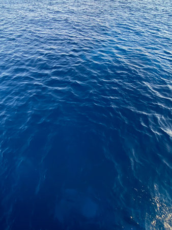 Blue sea water surface with ripples and waves. Sea background.