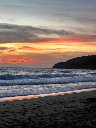 Sunset on the beach at Karon, Phuket, Thailand