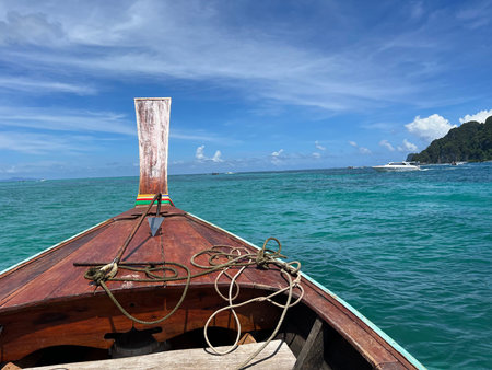 Thai long tail boat in the sea and blue sky background.の写真素材
