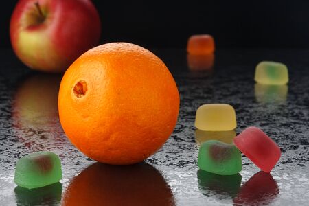 Orange and marmalade on a black backgroundの写真素材