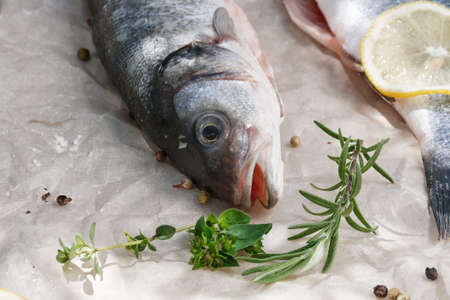 Fresh fish, Seabass, seasoned with spices, garlic and salt.の写真素材
