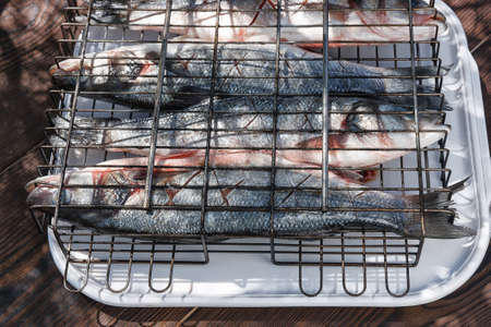 Fresh fish, Seabass, seasoned with spices, garlic and salt.の写真素材