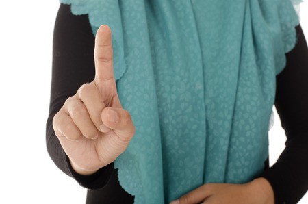 Business woman pointing at something on screenの写真素材