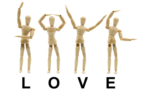 Collection of Wooden Mannequin Posed Word "LOVE" Conceptの写真素材