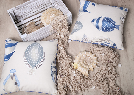 bedroom children's style sea decor with pillows and seashellsの写真素材