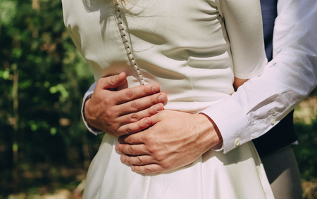 loving couple hugging close white clothes summerの写真素材