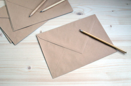 kraft brown envelope for study work and creativity with objects and inscription