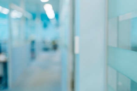 blurred office corridor and doors and partitions without focus