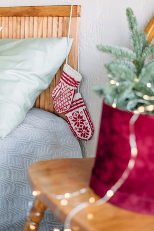 Rustic room decoration for Christmas parties with gift boxes and pine needles green brown beigeの写真素材
