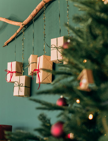 gift boxes decorated with ribbons with a Christmas tree for the new year