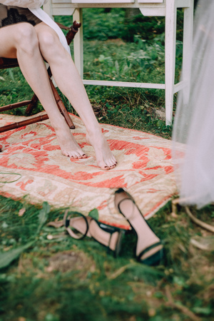 morning brides fees outside feet shoes and dressの写真素材