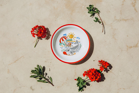 mockup marine plate with flowers and eucalyptusの写真素材