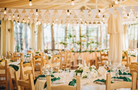 decor festive lighting lamps and flags in the hall for the celebrationの写真素材