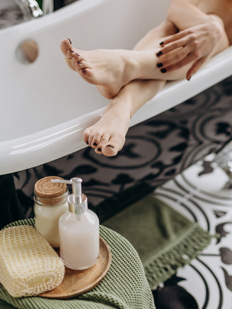 feet girl in the bathroom tenderness with tulip cosmetics conceptualの写真素材