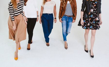 fashion clothes diversity group of models in motion on a white backgroundの写真素材