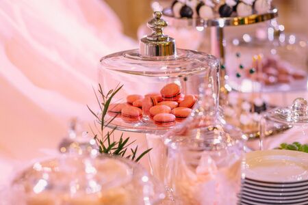 sweets marmalade and cookies table with dessert food with glassware decorの写真素材