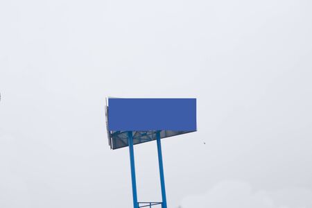 large advertising billboard light on the road in the autumn winter seasonの写真素材