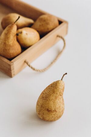 pears group ripe food fruit empty space yellow on a white backgroundの写真素材