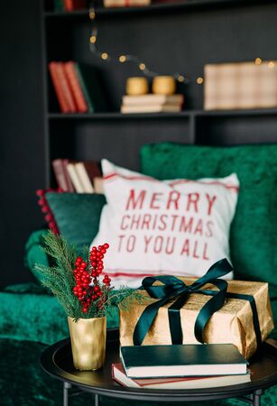 new year christmas decorated elegant interior house velvet green sofa black style cabinetの写真素材
