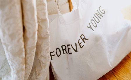 eco fabric bag with beige handles on a white background