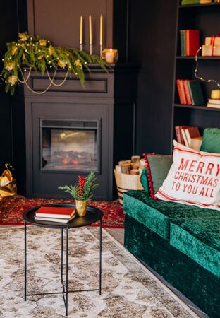 celebration christmas home interior black green velvet sofa subject symbol goldenの写真素材