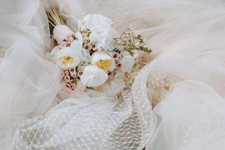 wedding decor flowers postcard on a veil dress white beigeの写真素材