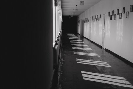 retro details building inside corridor doors vintage lines and light from the windowの写真素材