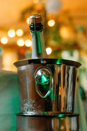 festive set champagne ice gold background garland blur light brightの写真素材