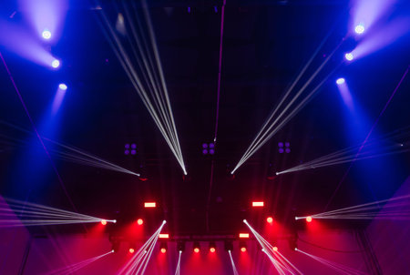 concert hall musical performance stage with light people hands crowd