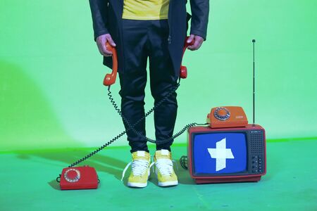 TV workshop repair old appliances retro electro technics vintage and dial telephoneの写真素材